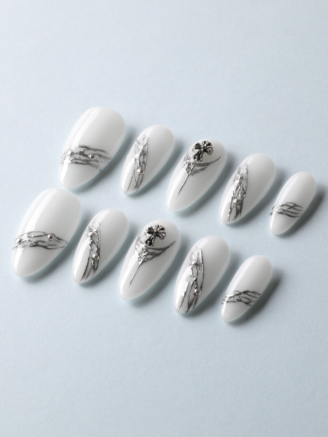 Metallic Patterned White Nails