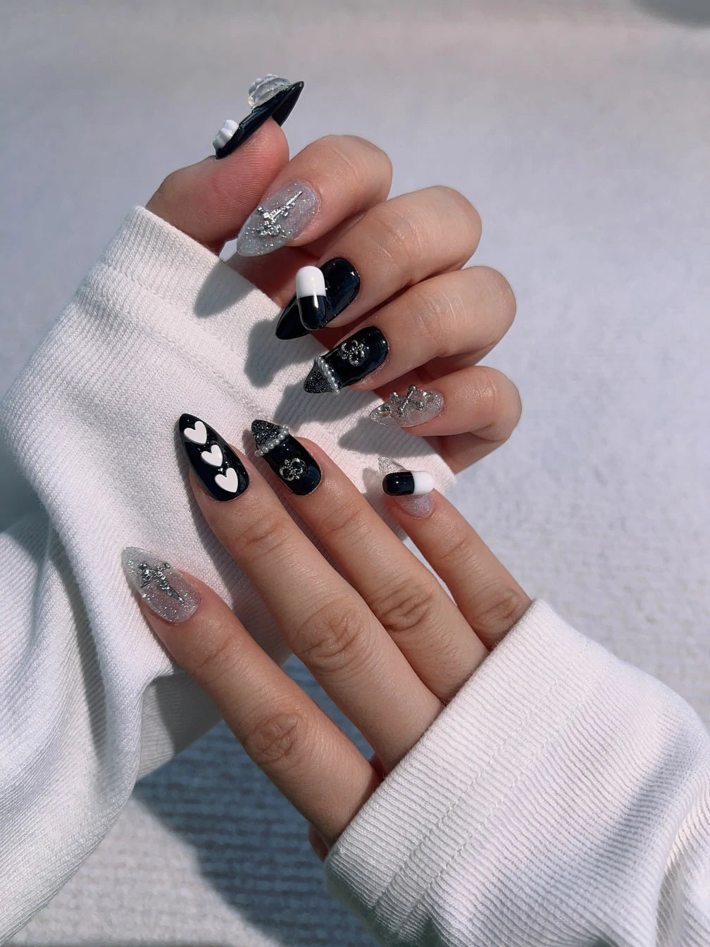 Joyee-handmade-press-on-nails-edgy-pill-med-almond-nail-hands-on-picture-2